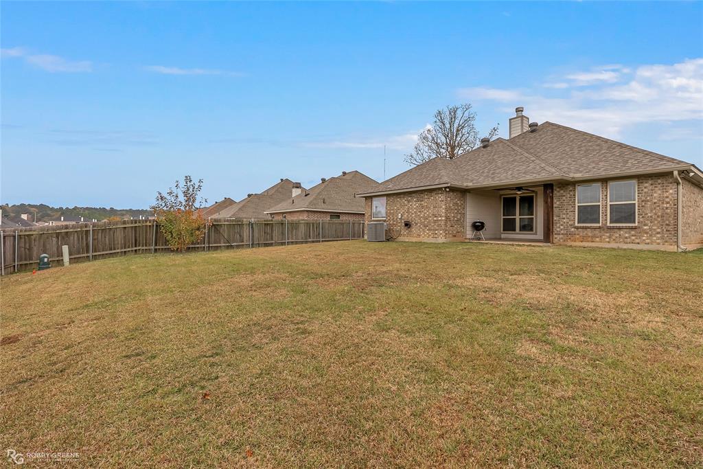 4917 Players Loop Blanchard, LA 71107 - Photo 7 of 31 a view of a house with a yard