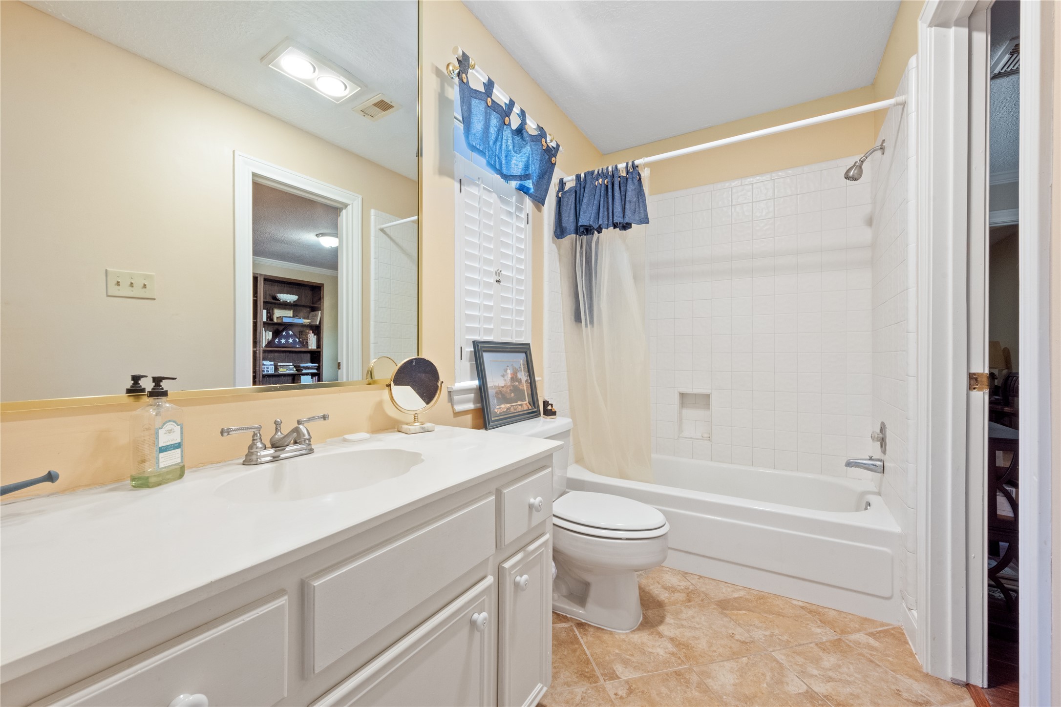 7639 Post Bridge Road Spring, TX 77389 - Photo 34 of 42 a bathroom with a sink a toilet and a bathtub