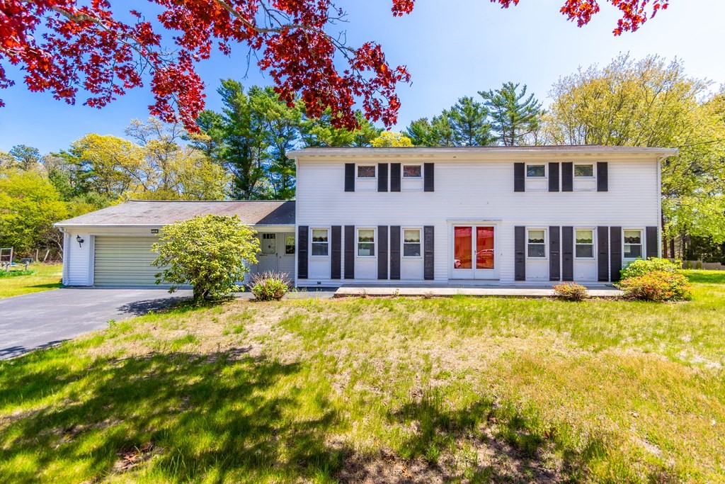 a front view of a house with swimming pool