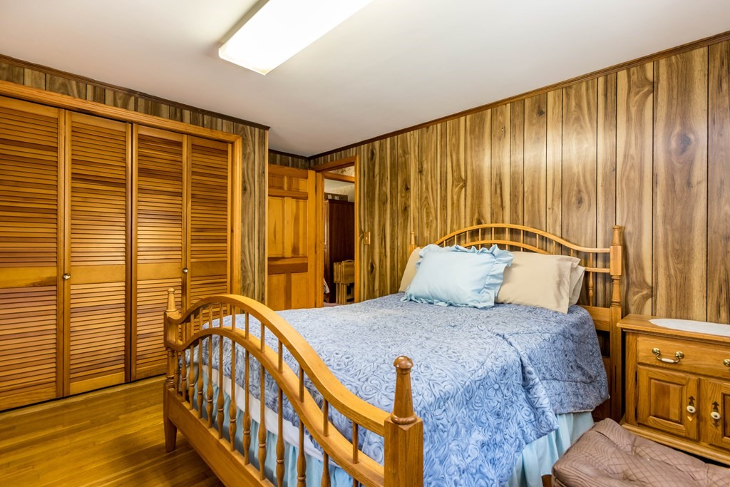 10 Dowd Avenue Wareham, MA 02571 - Photo 11 of 34 a large bedroom with a bed and wooden floor