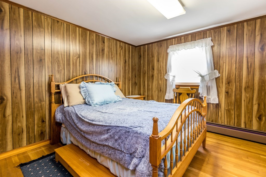 10 Dowd Avenue Wareham, MA 02571 - Photo 12 of 34 a bedroom with a bed and wooden floor