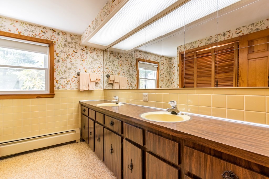 10 Dowd Avenue Wareham, MA 02571 - Photo 13 of 34 a bathroom with a sink and a mirror
