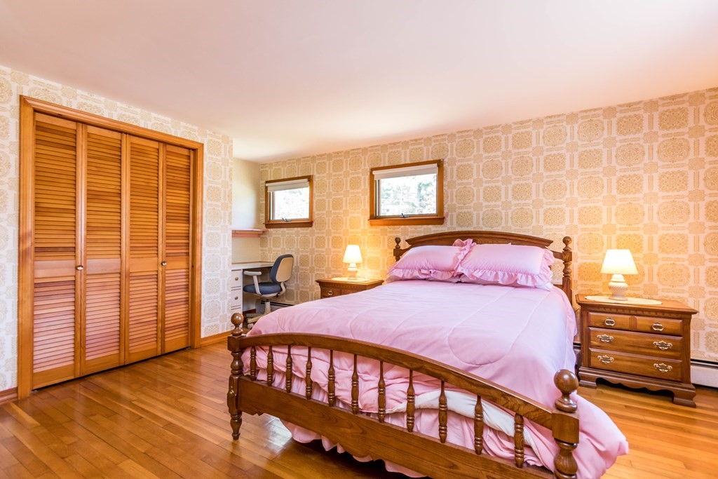 10 Dowd Avenue Wareham, MA 02571 - Photo 19 of 34 a bedroom with a bed next to a large window