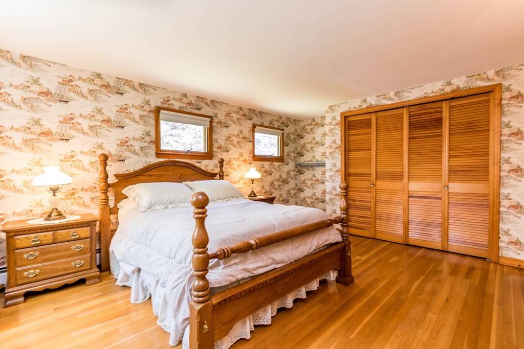 10 Dowd Avenue Wareham, MA 02571 - Photo 21 of 34 a bedroom with a bed and wooden floor