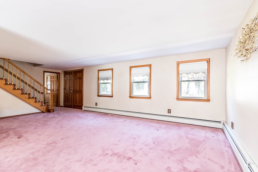 10 Dowd Avenue Wareham, MA 02571 - Photo 4 of 34 an empty room with windows