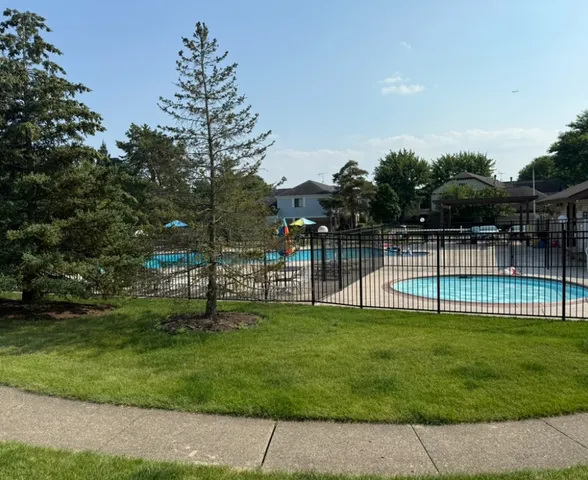 a view of a park with a slide