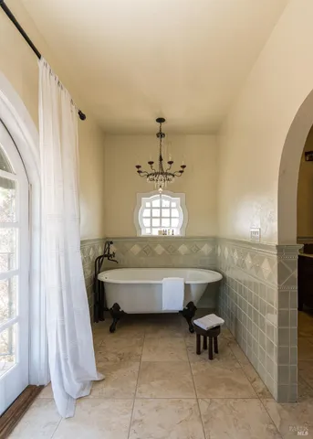 a bathroom with a sink a bathtub and a shower