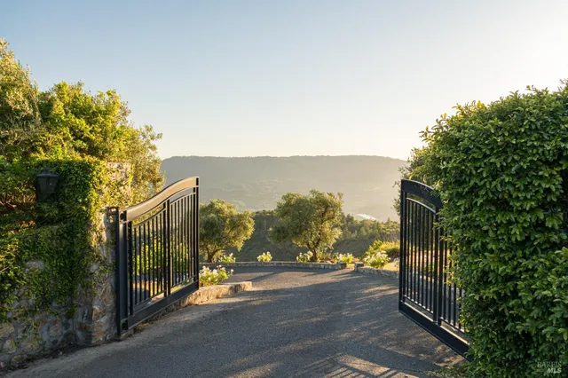 a view of a street with a building in the background