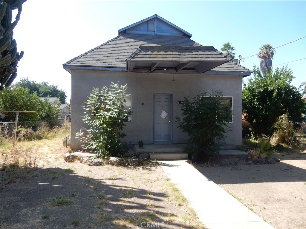 2476 5th Street Riverside, CA 92507 - Photo 1 of 1 a front view of a house with a yard