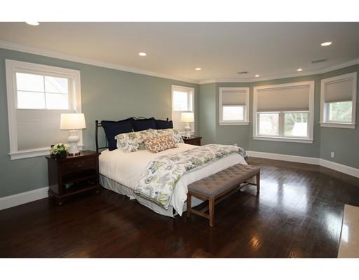 18 Colgate Road Needham, MA 02492 - Photo 12 of 23 a bedroom with a bed and wooden floor