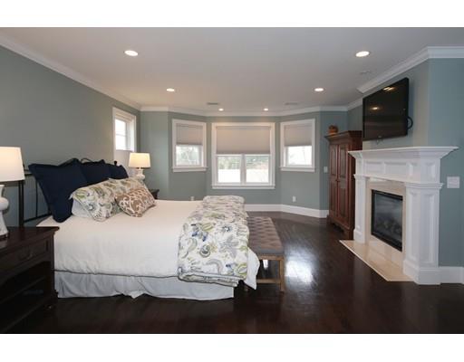 18 Colgate Road Needham, MA 02492 - Photo 13 of 23 a bed room with a bed and a television