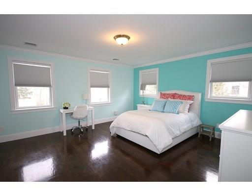 18 Colgate Road Needham, MA 02492 - Photo 15 of 23 a bedroom with a bed and a table