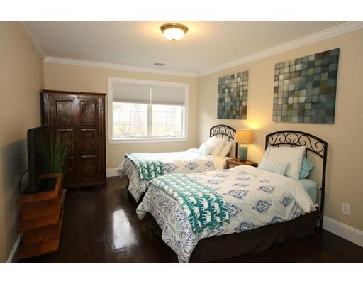 18 Colgate Road Needham, MA 02492 - Photo 17 of 23 a bedroom with two beds and a window