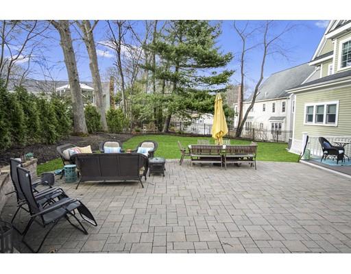18 Colgate Road Needham, MA 02492 - Photo 23 of 23 a view of a patio with table and chairs and potted plants