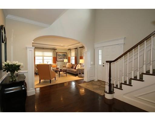 18 Colgate Road Needham, MA 02492 - Photo 3 of 23 a living room with lots of furniture and a potted plant