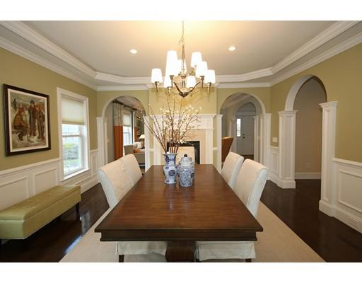 18 Colgate Road Needham, MA 02492 - Photo 6 of 23 a view of a dining room with furniture and a chandelier