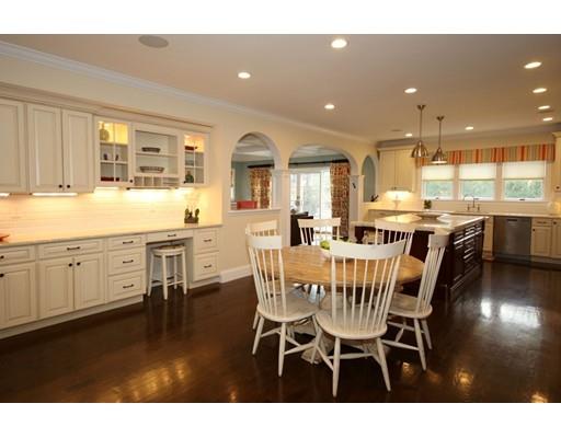 18 Colgate Road Needham, MA 02492 - Photo 8 of 23 a view of a dining room with furniture and wooden floor