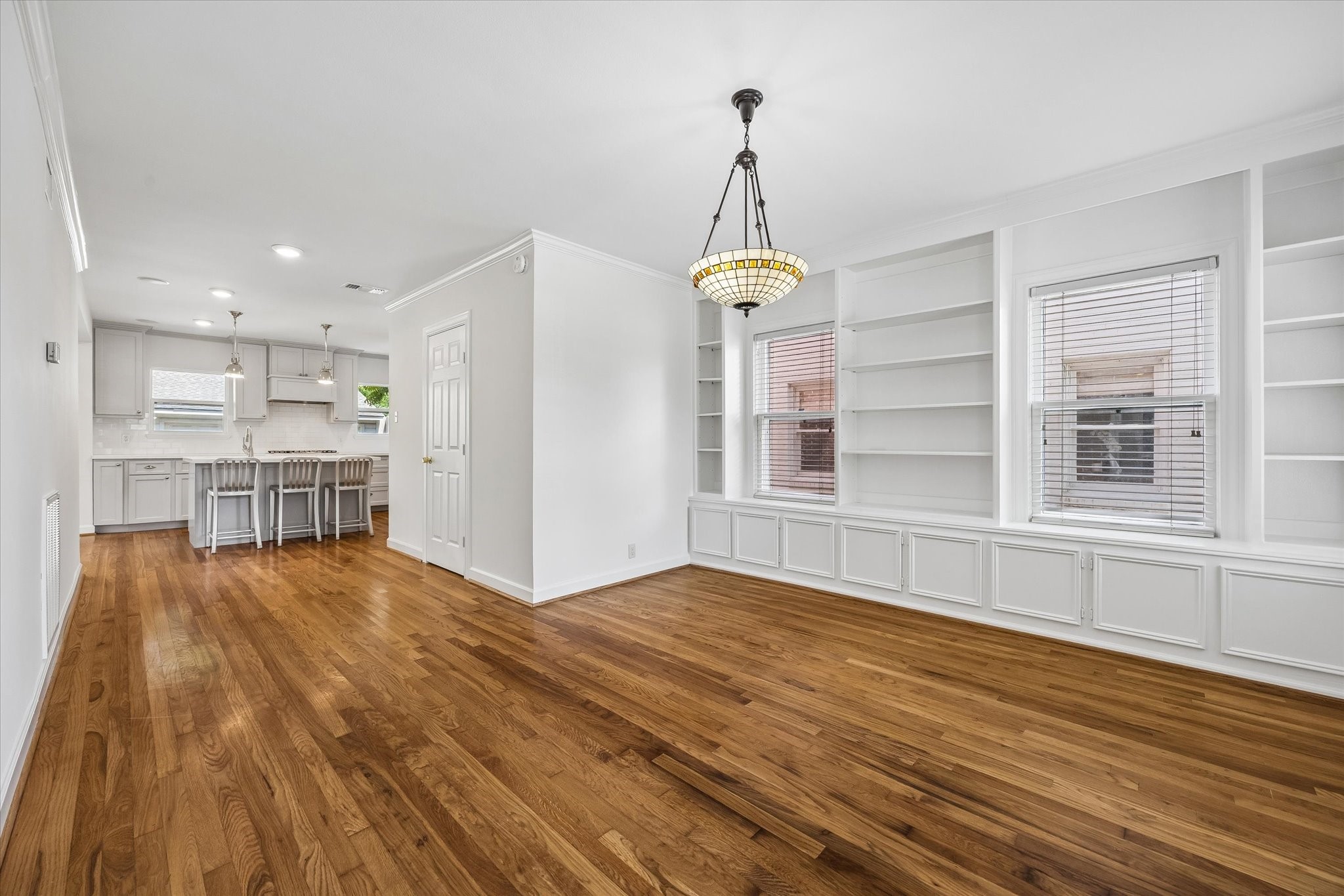 2340 Albans Road Houston, TX 77005 - Photo 29 of 29 View of open floorplan Kitchen and Family Room with more built-in bookshelves