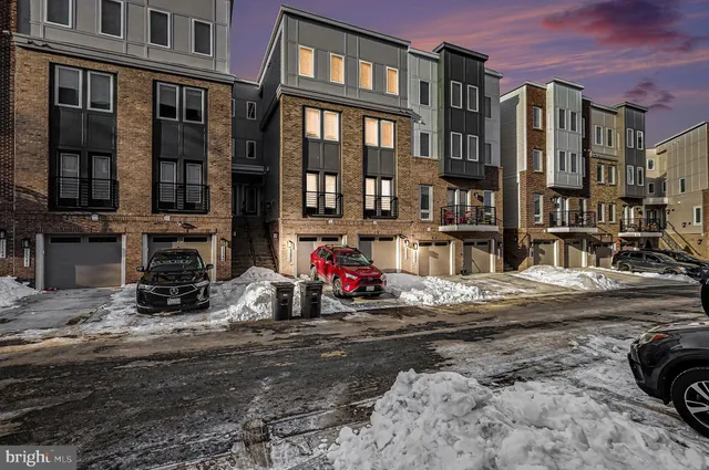 a view of a street with cars