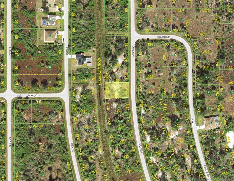 7049 Manniz Road Port Charlotte, FL 33981 - Photo 2 of 4 a bathroom with a shower