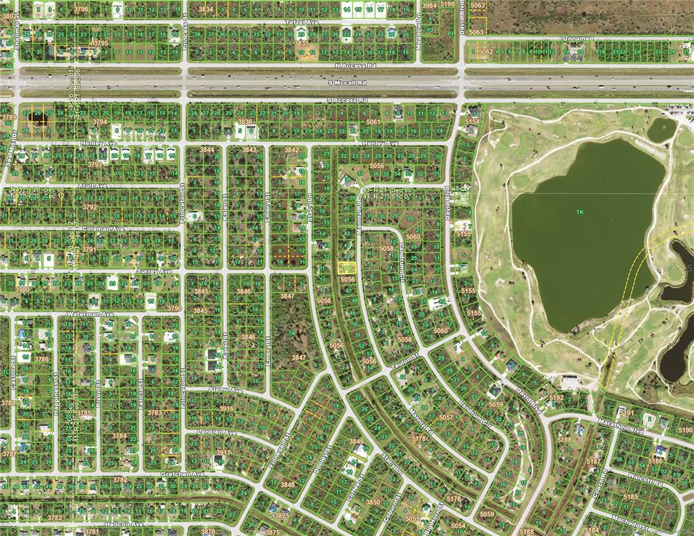 7049 Manniz Road Port Charlotte, FL 33981 - Photo 4 of 4 a view of a tennis court