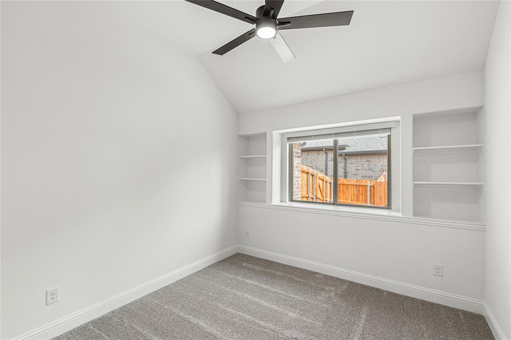 901 Split Oak Lane Anna, TX 75409 - Photo 23 of 31 an empty room with a window
