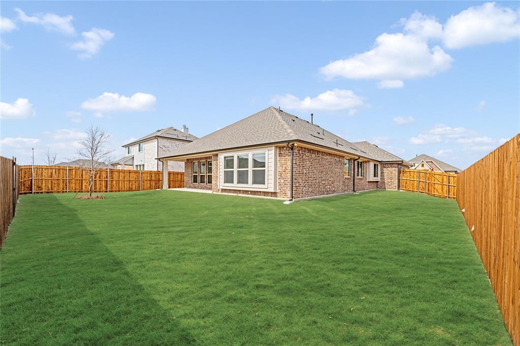 901 Split Oak Lane Anna, TX 75409 - Photo 29 of 31 a view of an house with backyard and porch