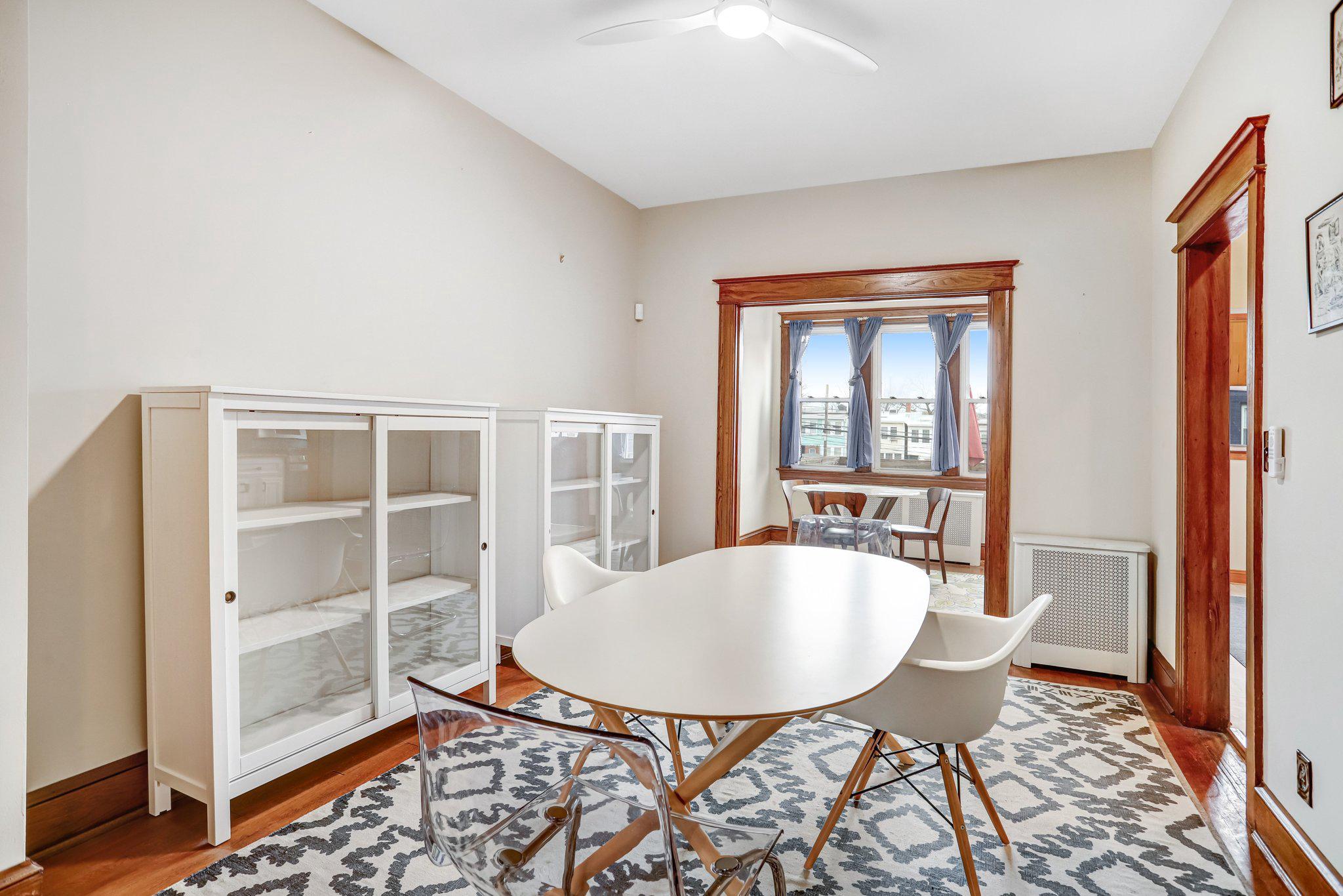 114 Madison Street Northwest Washington, DC 20011 - Photo 12 of 80 a view of a dining room with furniture window and wooden floor