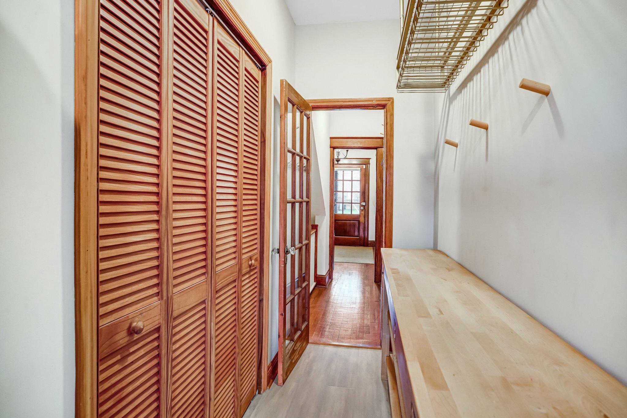 114 Madison Street Northwest Washington, DC 20011 - Photo 27 of 80 a view of a hallway with wooden floor and a bathroom