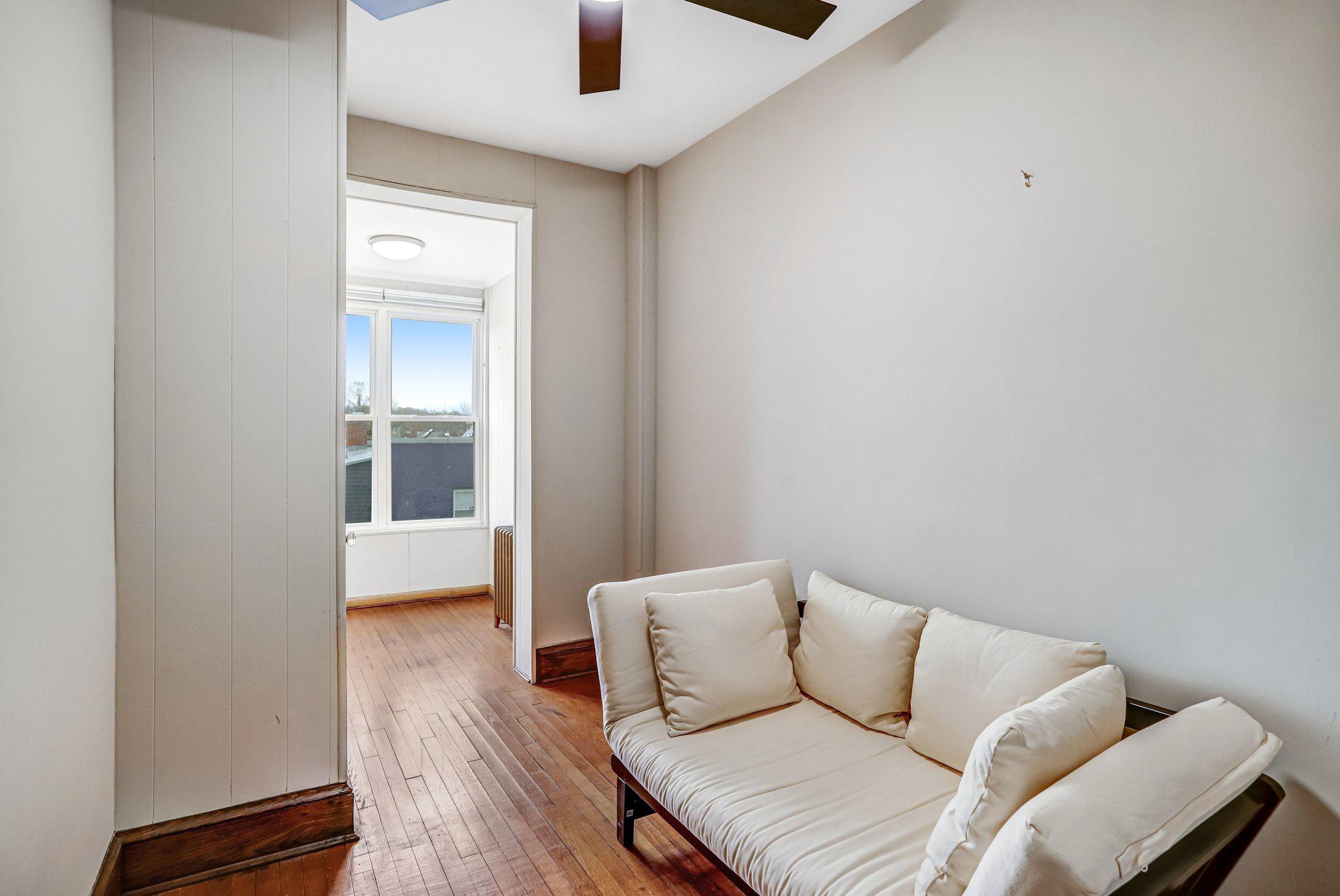 114 Madison Street Northwest Washington, DC 20011 - Photo 45 of 80 a living room with furniture and a window