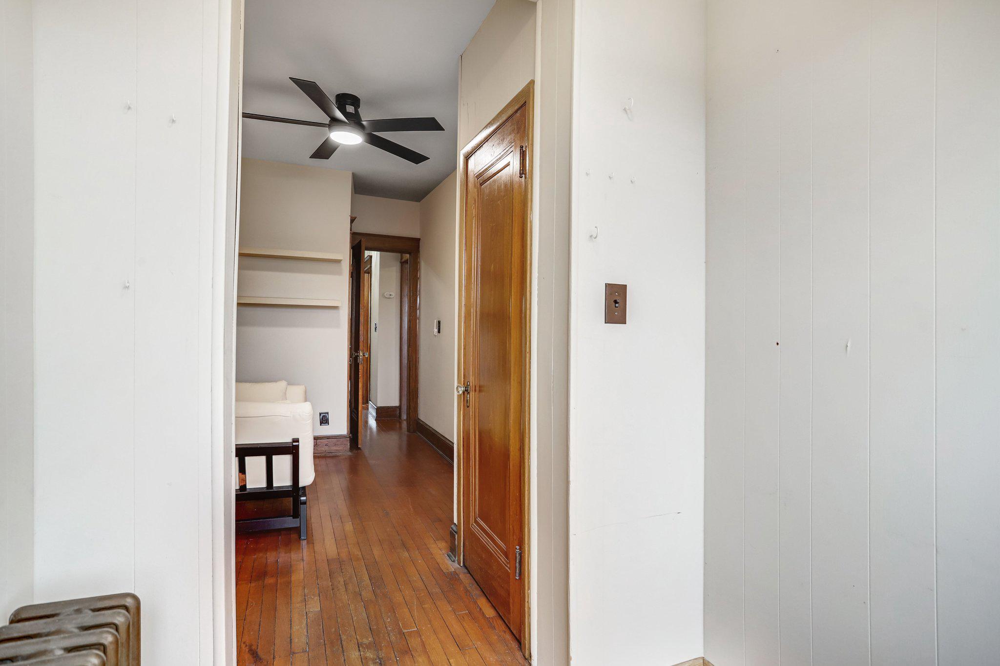 114 Madison Street Northwest Washington, DC 20011 - Photo 49 of 80 a view of a hallway with wooden floor and closet