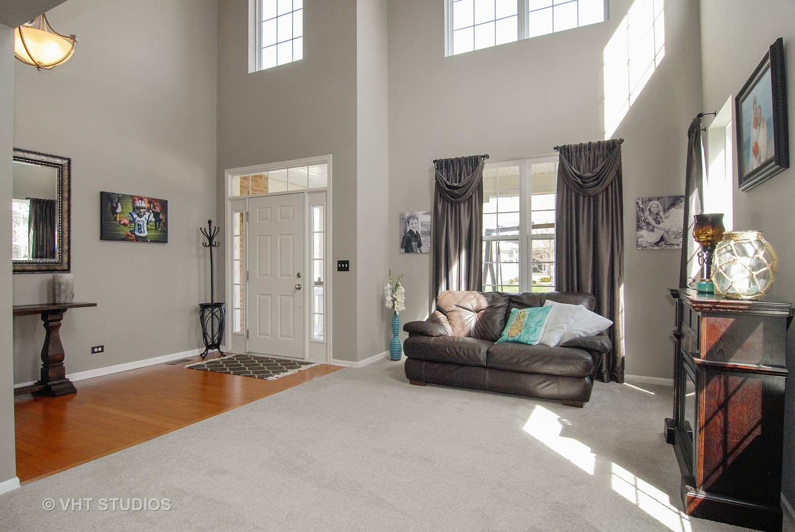 309 Monument Road Elgin, IL 60124 - Photo 3 of 25 a living room with furniture and a flat screen tv