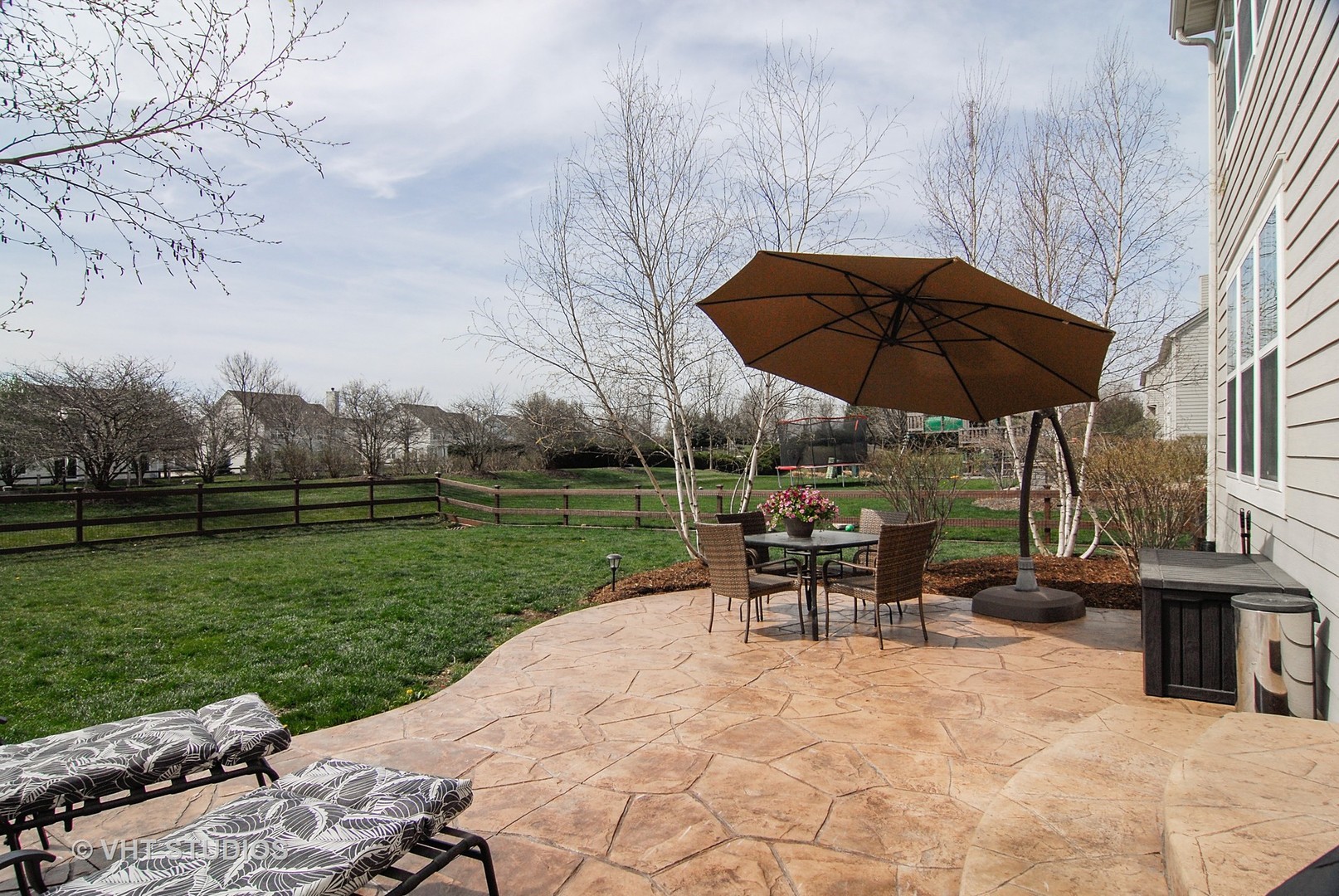 309 Monument Road Elgin, IL 60124 - Photo 23 of 25 a view of a backyard with sitting area