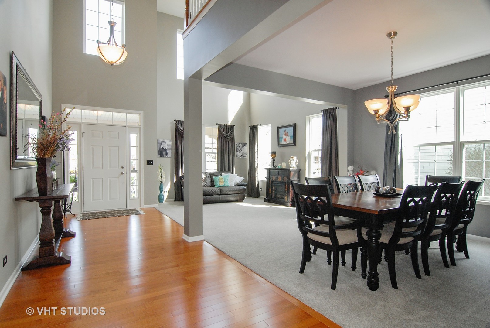 309 Monument Road Elgin, IL 60124 - Photo 5 of 25 a view of a dining room with furniture window and wooden floor