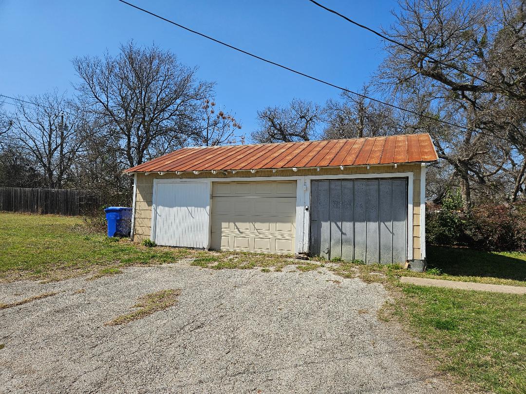 1130 North Main Street Elgin, TX 78621 - Photo 11 of 16 a view of a house with a yard