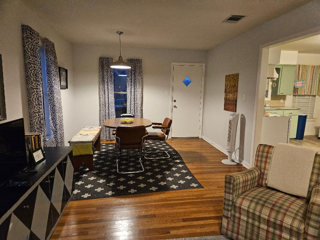 1130 North Main Street Elgin, TX 78621 - Photo 4 of 16 a living room with furniture rug and window