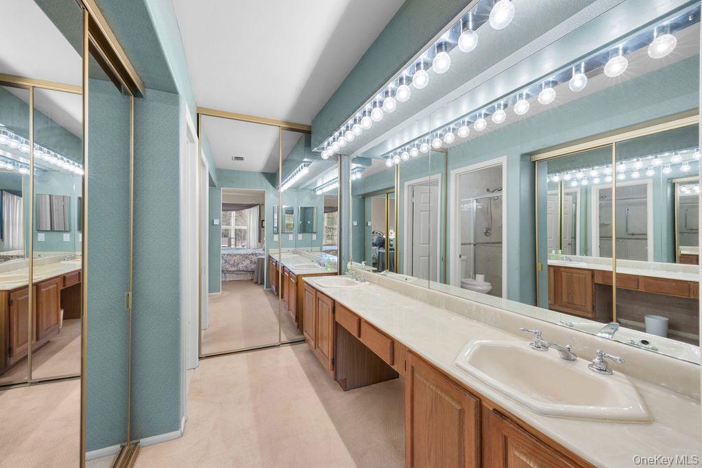 16 Huntington Court Ridge, NY 11961 - Photo 29 of 43 a large spacious bathroom with a large tub and shower