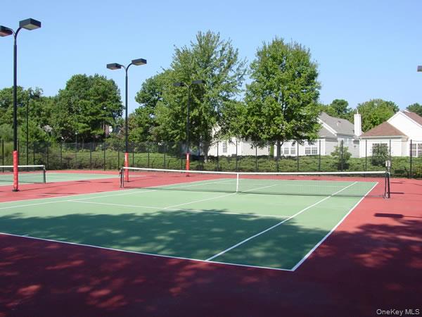 16 Huntington Court Ridge, NY 11961 - Photo 37 of 43 a view of a tennis court