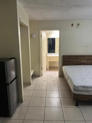 a view of a entryway with furniture and a window