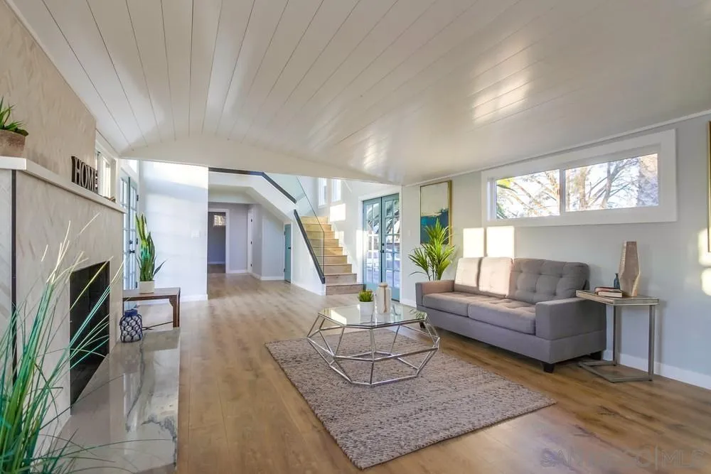 545 Ocean View Avenue Encinitas, CA 92024 - Photo 12 of 75 a living room with furniture and a fireplace