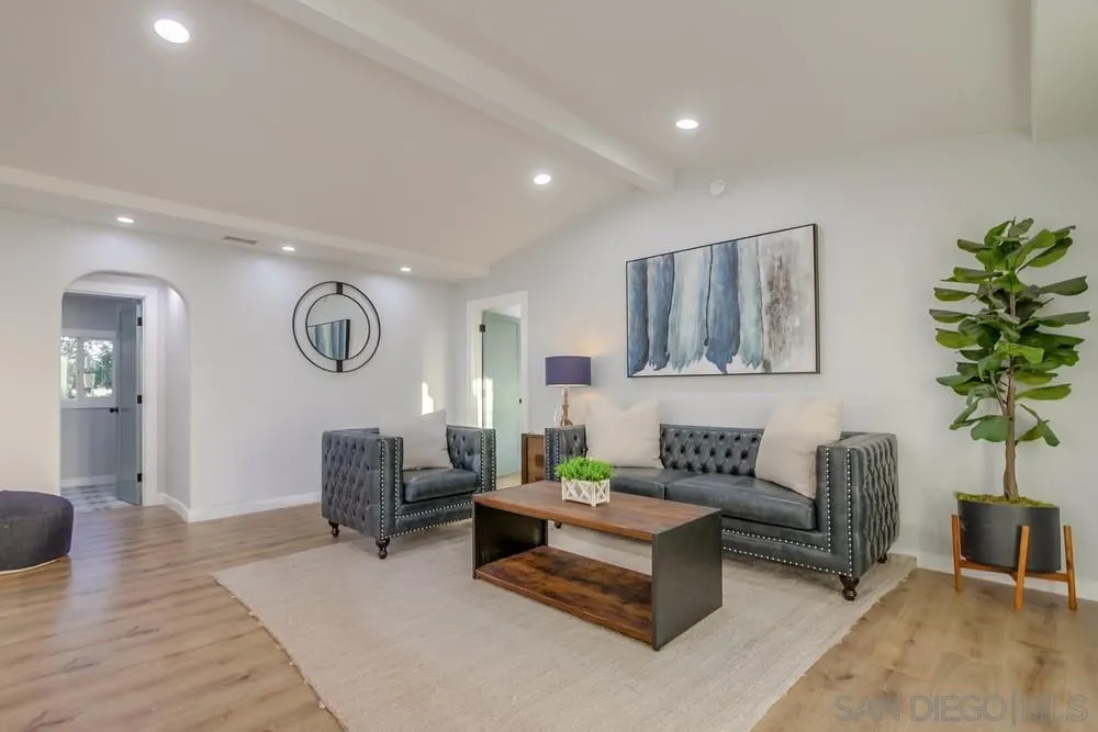 545 Ocean View Avenue Encinitas, CA 92024 - Photo 13 of 75 a living room with furniture and a potted plant