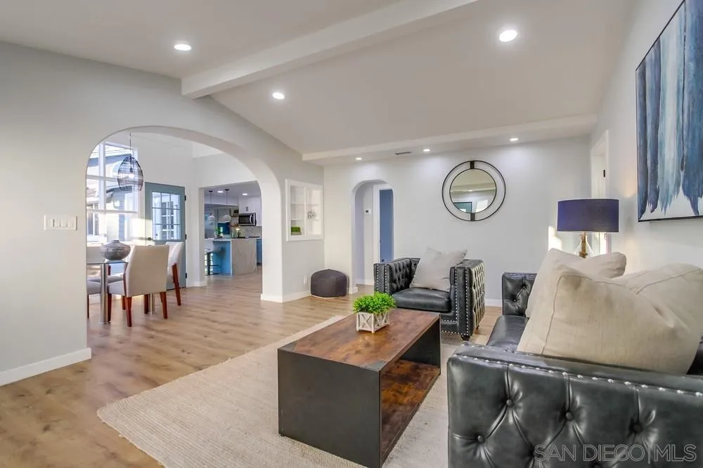 545 Ocean View Avenue Encinitas, CA 92024 - Photo 14 of 75 a living room with furniture and wooden floor