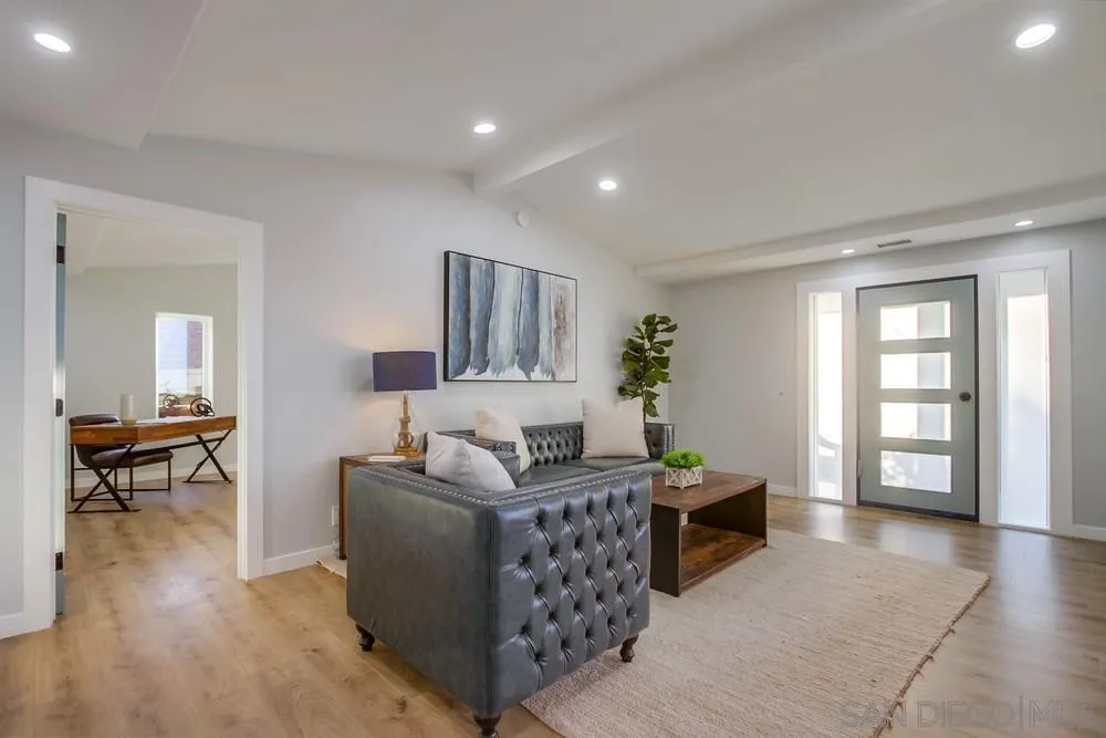 545 Ocean View Avenue Encinitas, CA 92024 - Photo 15 of 75 a living room with furniture and a wooden floor