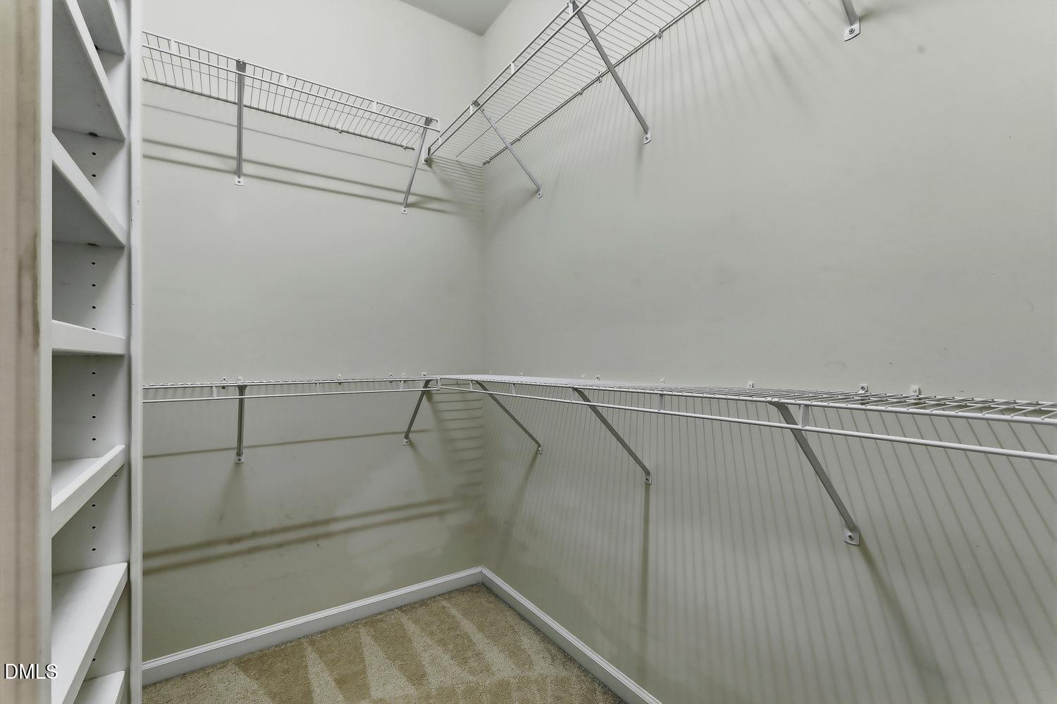 9137 Wooden Road Raleigh, NC 27617 - Photo 30 of 55 034-010-Primary Closet-1500x1000