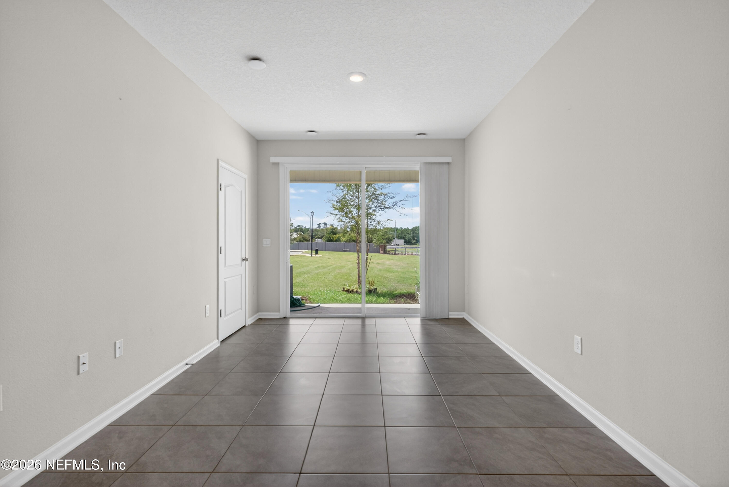 8210 Larose Road Jacksonville, FL 32211 - Photo 11 of 38 a view of an empty room with a window