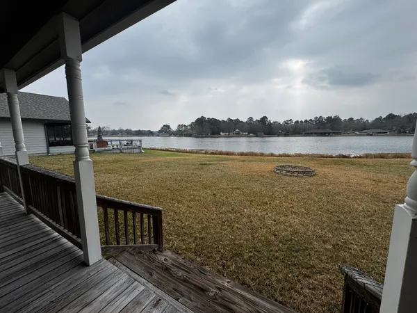 a view of a lake from a balcony