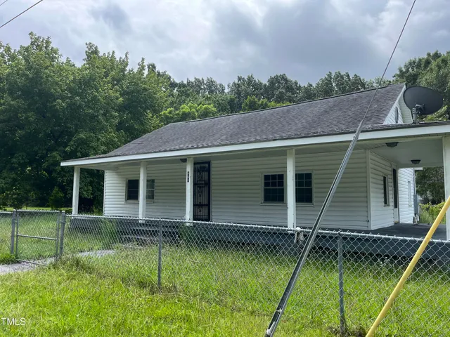 a house view with a garden space