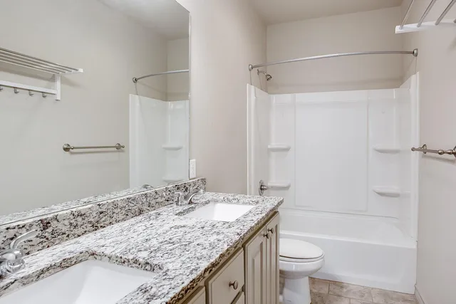 a bathroom with a sink and a shower