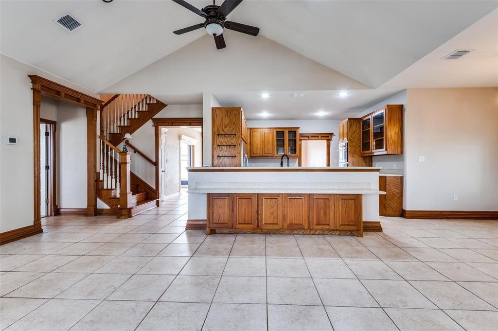 5520 Dido Hicks Road Fort Worth, TX 76179 - Photo 12 of 33 a view of a kitchen with a sink and cabinets