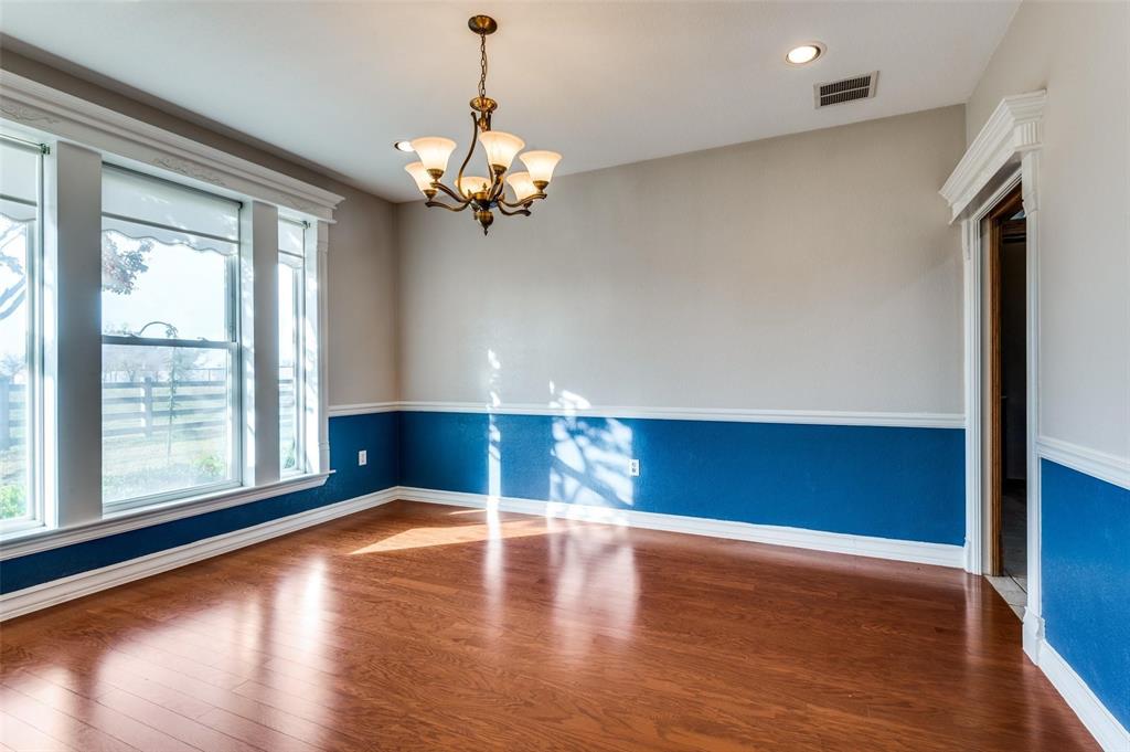 5520 Dido Hicks Road Fort Worth, TX 76179 - Photo 18 of 33 a view of a livingroom with a ceiling fan and window